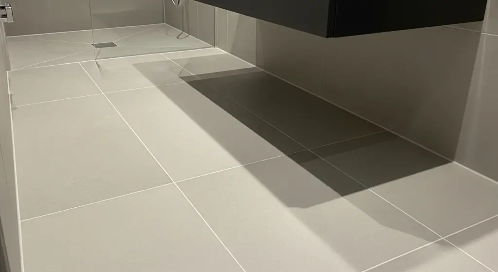 Use Light-Colored, Large Tiles Lengthwise
